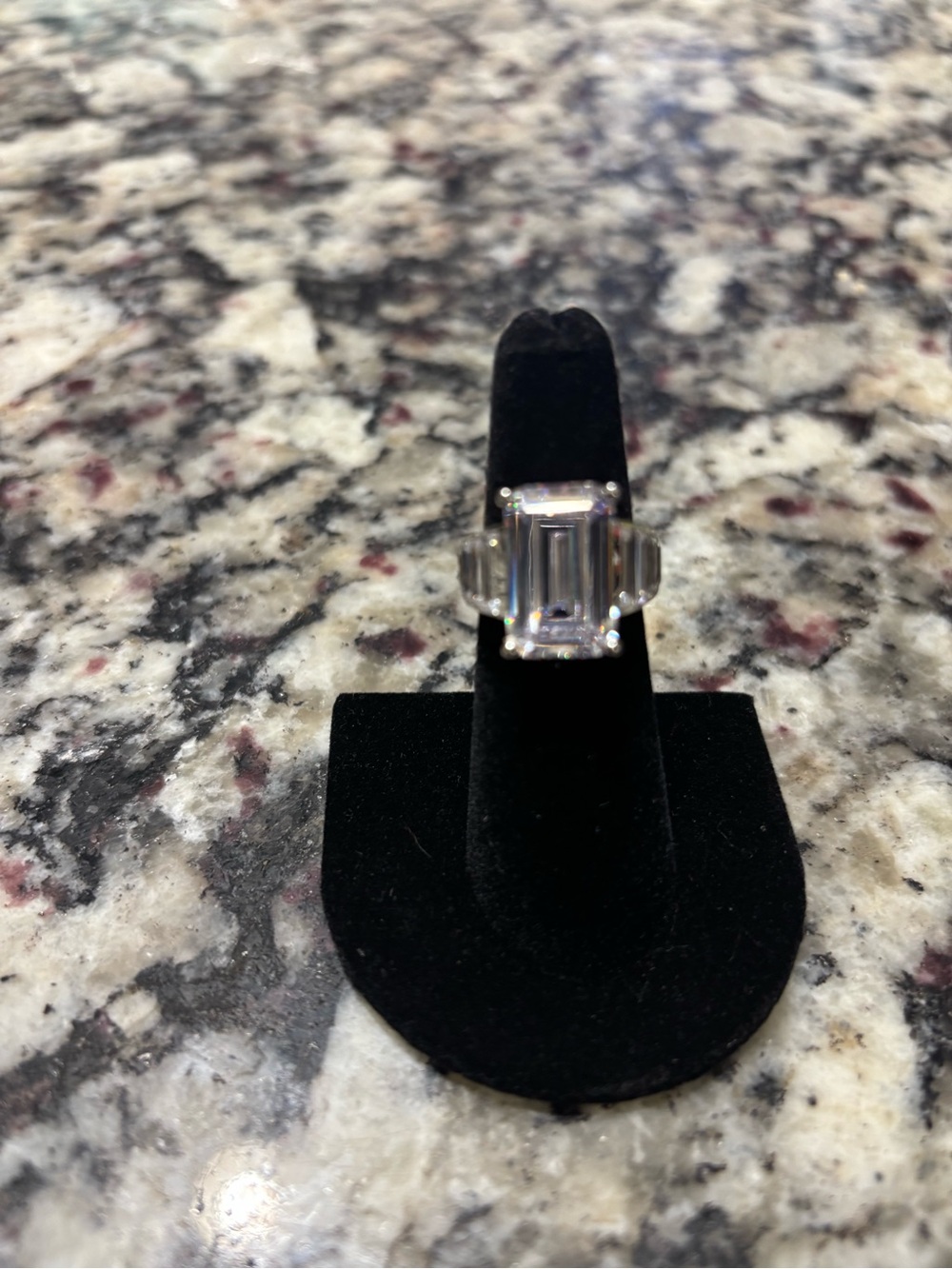Elegant Emerald-Cut Clear Crystal Ring in Silver-Tone. Size 6.